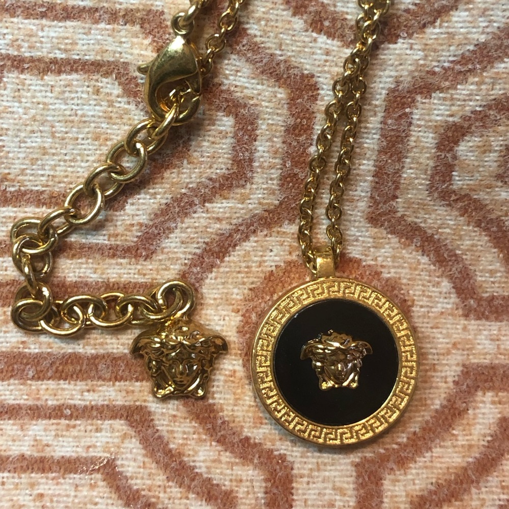 VERSACE
Gold & Black Enamel Medusa Necklace
